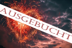 Colorful fireworks on the background of the night sky with clouds.